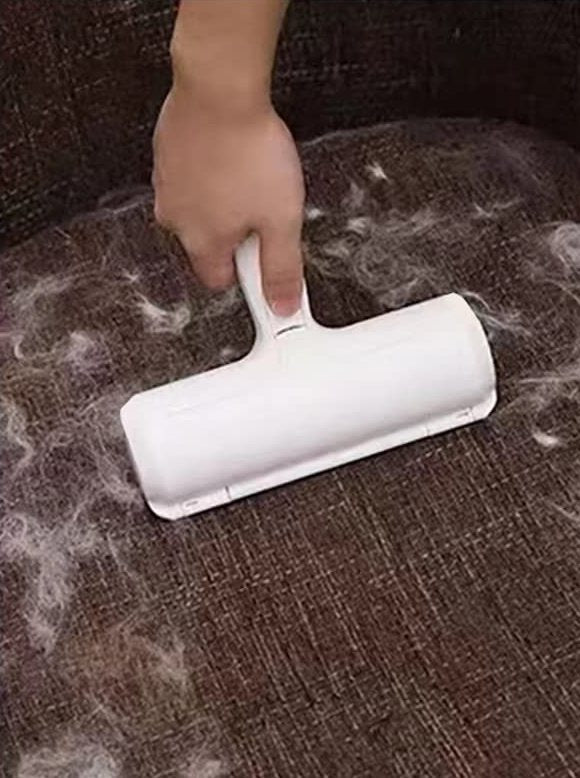 The same cushion with the reusable roller clearing a stripe of fur