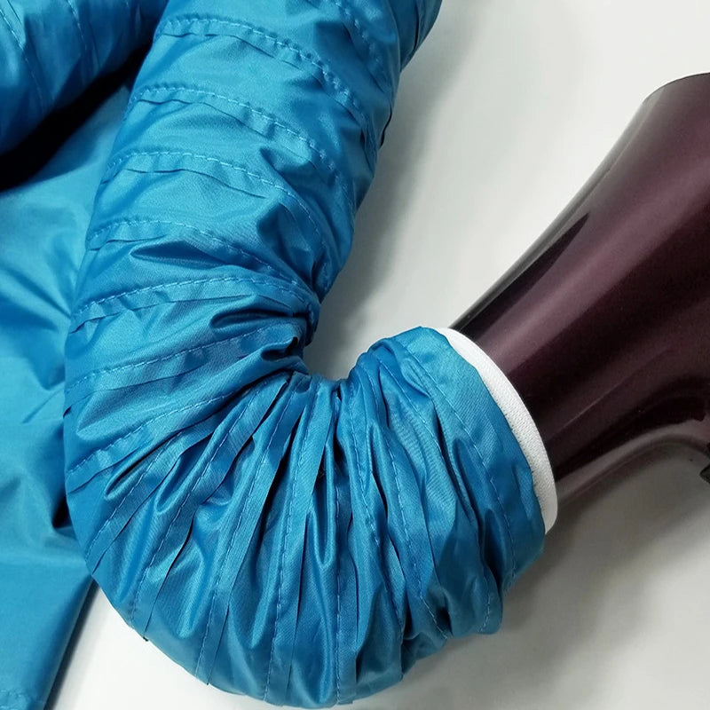 The bag's hose fitted over a hair dryer nozzle