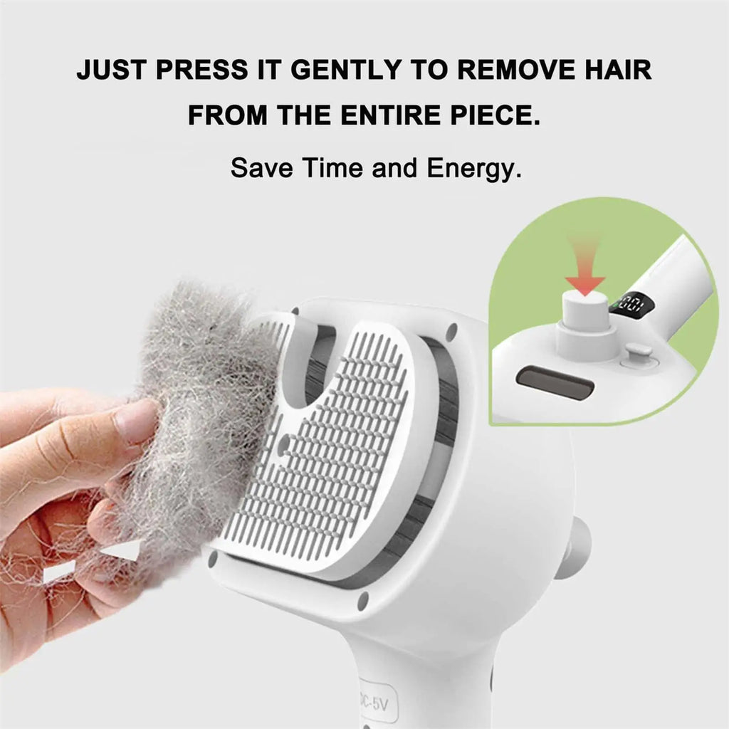 Pressing the release button to lift a whole sheet of gray fur off the pins