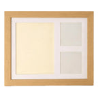 The natural wood frame with its mat, empty