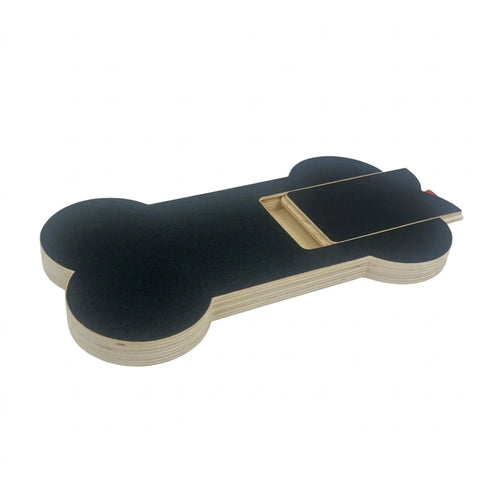 The bone board with its sandpaper-top treat drawer slid half open