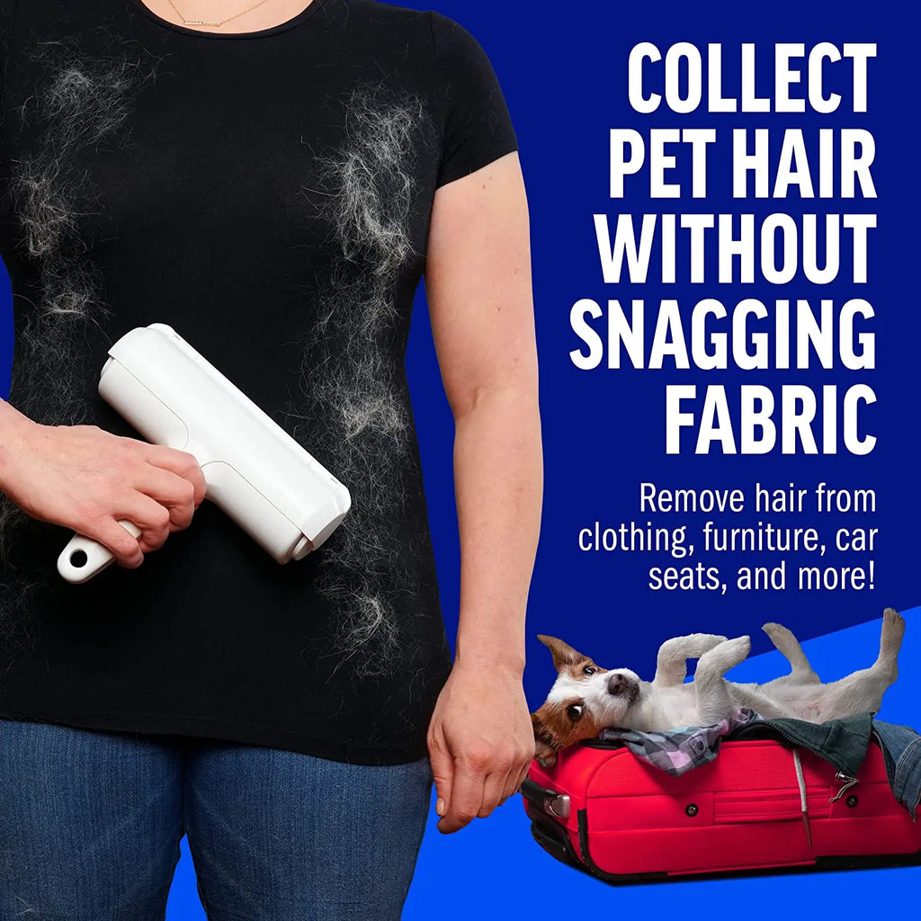 Woman in a fur-covered black tee holding the roller, a Jack Russell on a suitcase