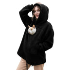 Black hoodie with a cat's head out of the pouch window