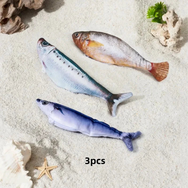 Sardine, saury and yellow croaker plush fish on sand with shells