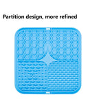 Blue lick mat from above: hexagons, a bone maze and bumps around a star-shaped center